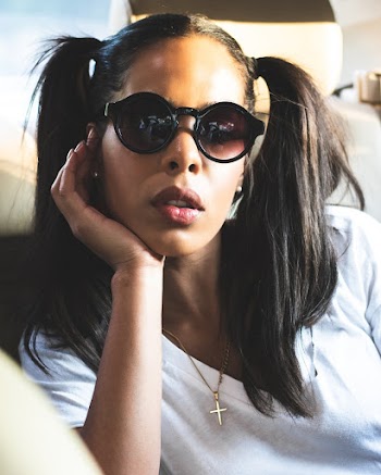 Photo of Woman Wearing Sunglasses