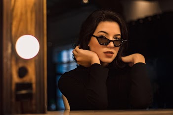 Photo of Woman Wearing Sunglasses