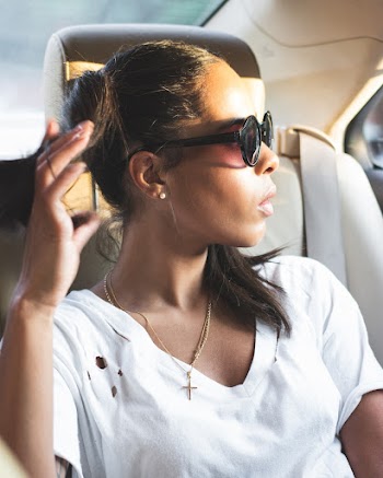 Photo of Woman Wearing Sunglasses