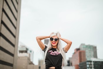 Photo of Woman Wearing Sunglasses
