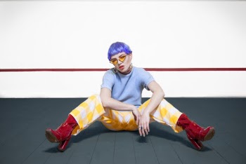 Photo of Woman Wearing Sunglasses
