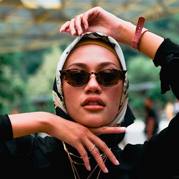 Photo of Woman Wearing Sunglasses