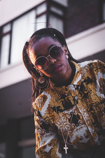 Photo of Woman Wearing Sunglasses
