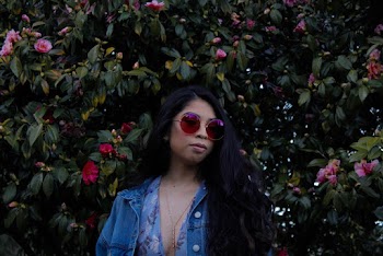 Photo of Woman Wearing Sunglasses