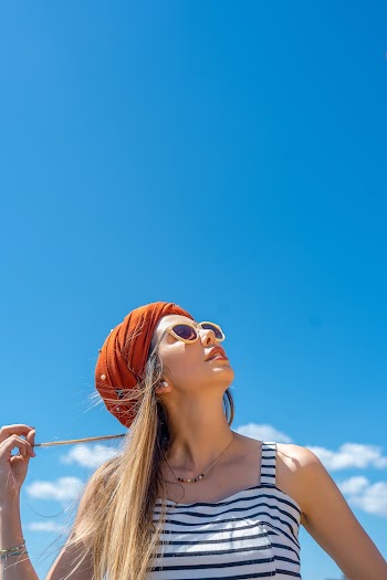 Photo of Woman Wearing Sunglasses