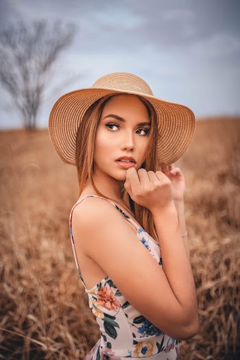 Photo Of Woman Wearing Sunhat 