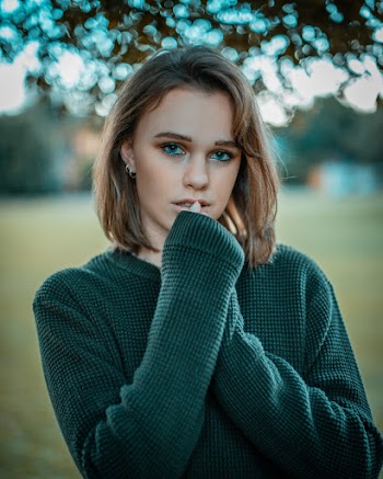 Photo of Woman Wearing Sweater