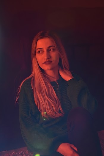 Photo of Woman Wearing Sweater