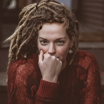 Photo of Woman Wearing Sweater
