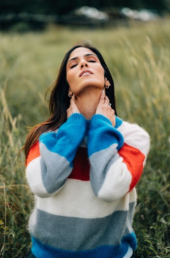 Photo Of Woman Wearing Sweater