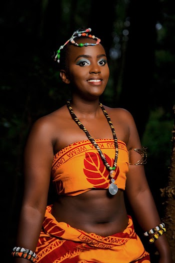 Photo of Woman Wearing Traditional Wear