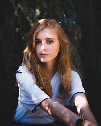 Photo of Woman Wearing V-Neck Shirt