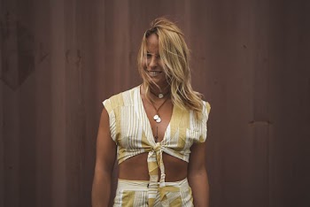 Photo of Woman Wearing White And Yellow Top
