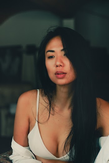 Photo Of Woman Wearing White Bikini Top