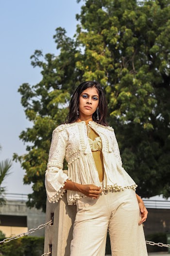 Photo Of Woman Wearing White Blazer