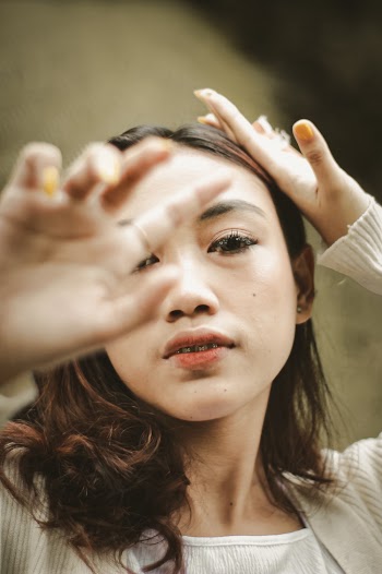 Photo Of Woman Wearing White Cardigan