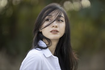 Photo Of Woman Wearing White Collared Shirt