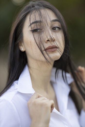 Photo Of Woman Wearing White Collared Shirt