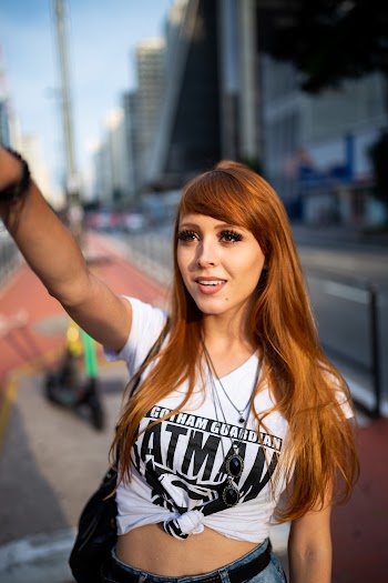 Photo of Woman Wearing White Crop Top