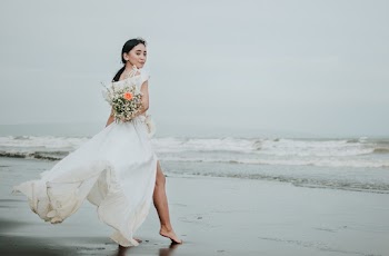 Photo Of Woman Wearing White Dress