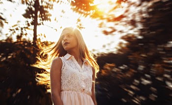 Photo Of Woman Wearing White Dress