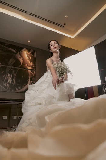 Photo Of Woman Wearing White Dress