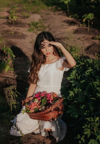 Photo of Woman Wearing White Dress