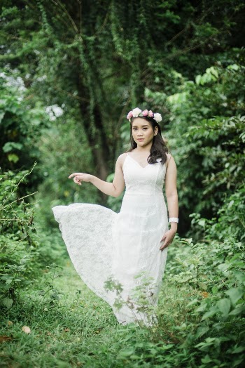 Photo Of Woman Wearing White Dress