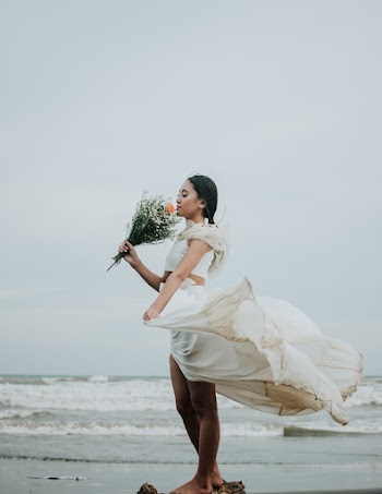Photo of Woman Wearing White Dress