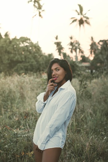 Photo of Woman Wearing White Dress Shirt