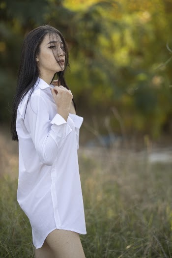 Photo Of Woman Wearing White Dress Shirt