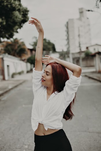 Photo Of Woman Wearing White Dress Shirt