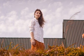 Photo of Woman Wearing White Dress Shirt