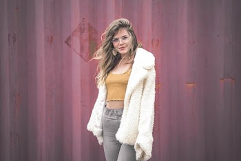 Photo of Woman Wearing White Fur Coat