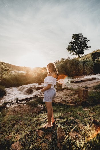 Photo Of Woman Wearing White Off Shoulder Top