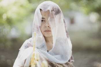 Photo Of Woman Wearing White Scarf