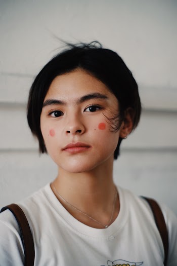 Photo of Woman Wearing White Shirt