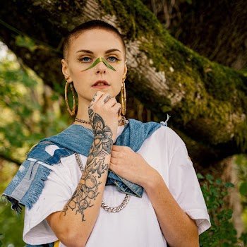 Photo Of Woman Wearing White Shirt
