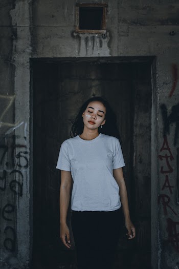Photo Of Woman Wearing White Shirt