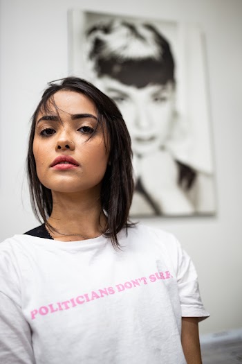 Photo of Woman Wearing White Shirt