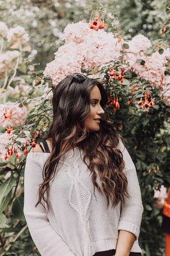 Photo Of Woman Wearing White Sweater