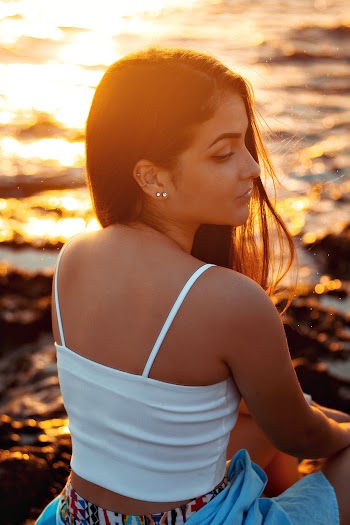 Photo Of Woman Wearing White Tank Top
