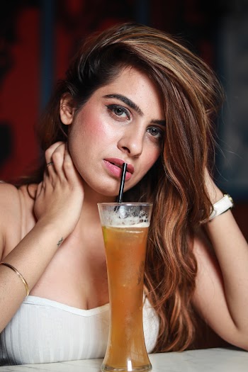 Photo of Woman Wearing White Top