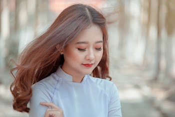 Photo of Woman Wearing White Top