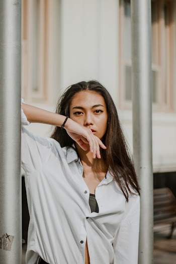 Photo of Woman Wearing White Top