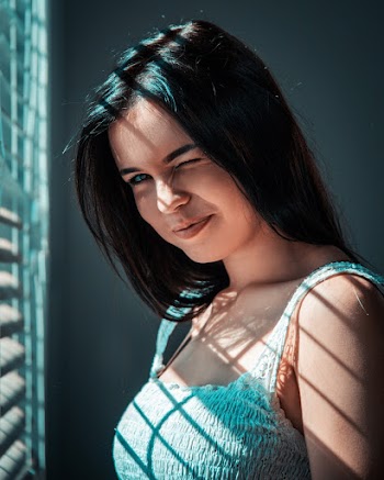 Photo of Woman Wearing White Top