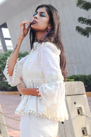 Photo Of Woman Wearing White Top