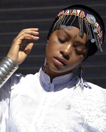 Photo Of Woman Wearing White Top