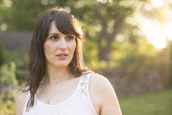 Photo of Woman Wearing White Top