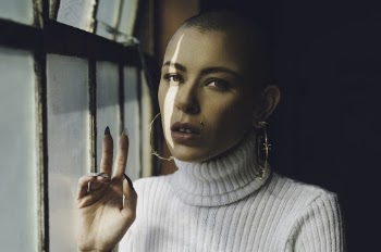 Photo Of Woman Wearing White Turtleneck Sweater